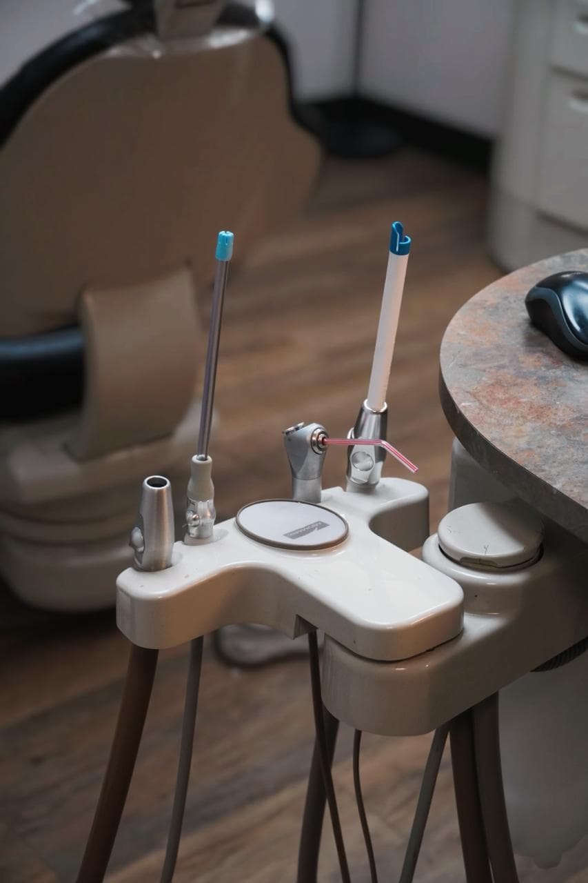 Chairside dental instruments prepared for precise treatment at The Smile Suite