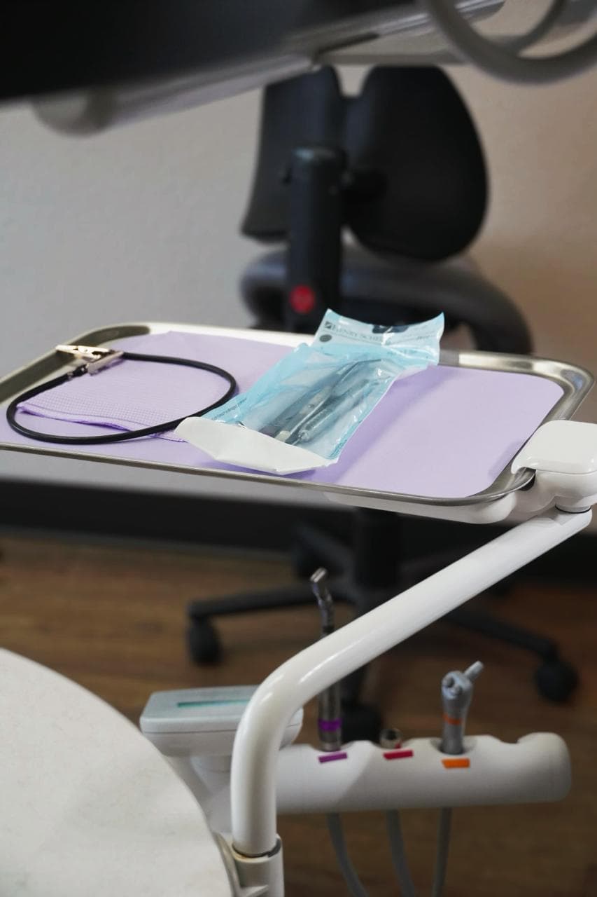 Prepared treatment tray inside a clean Smile Suite operatory